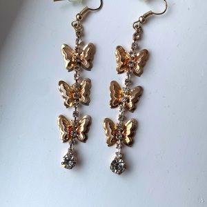 Gold dangle butterfly earrings